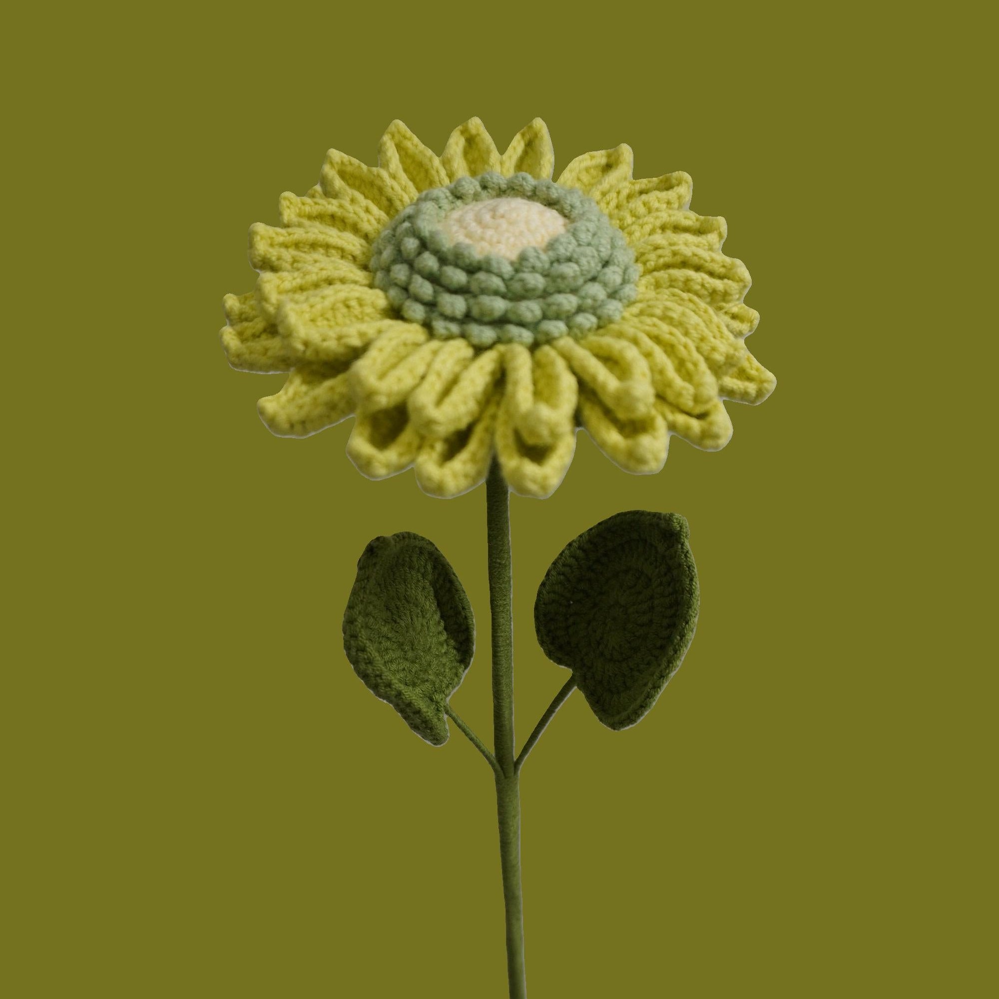Close-up of handmade crochet sunflower with yellow green petals – eco-friendly floral gift
