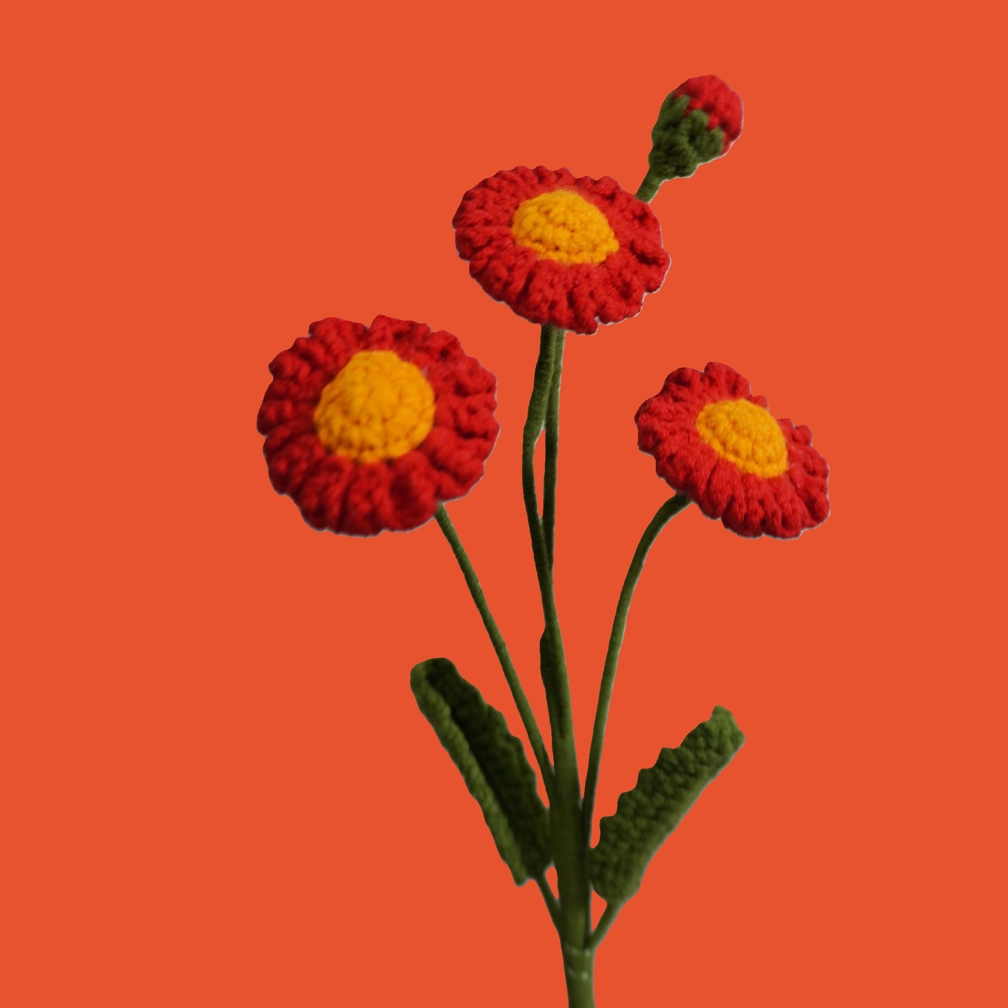 Handmade Little Daisy crochet flower – red petals and green stem for sustainable décor and gifts
