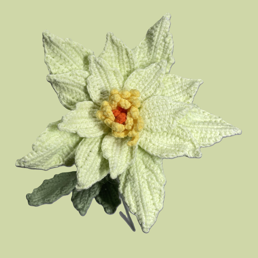 Handmade crochet Chinese rose flower in honey dew with green leaves for sustainable home decor and gifts
