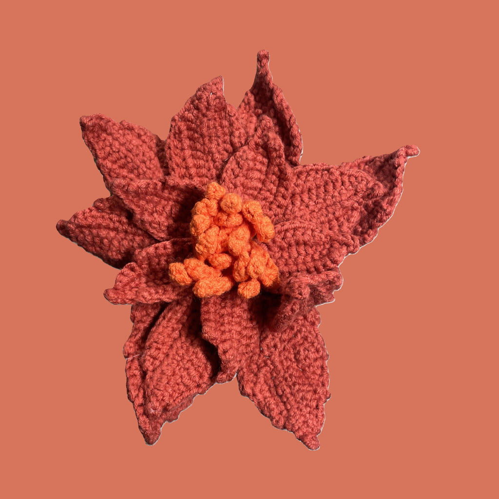 Handmade crochet Chinese rose flower in yellow red with green leaves for sustainable home decor and gifts

