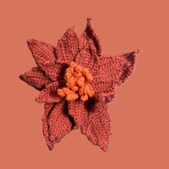 Handmade crochet Chinese rose flower in yellow red with green leaves for sustainable home decor and gifts
